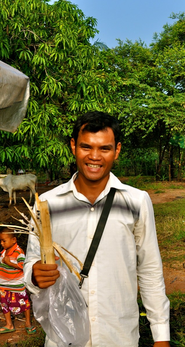 Mr. Sam enjoying a snack on the way to Beng Melea