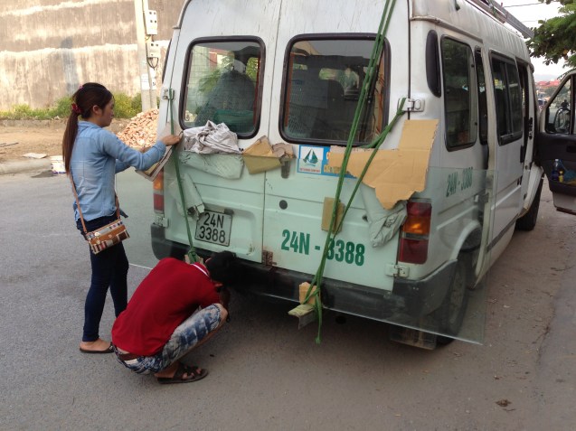 Strapping glass to our minibus
