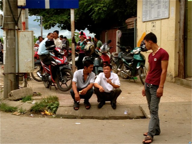 Sneakily scoping out the scammers at the Dien Bien Phu bus station